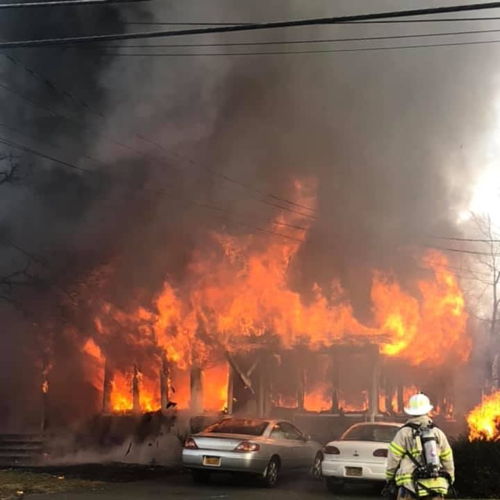 Multiple fire departments are battling a massive fire in Suffern.