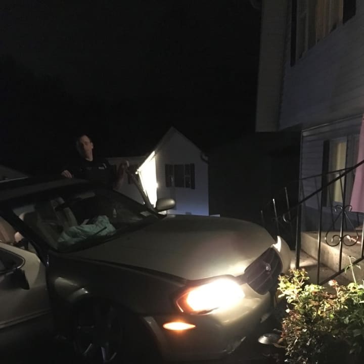 A car crashed into a Hillcrest house, police said.