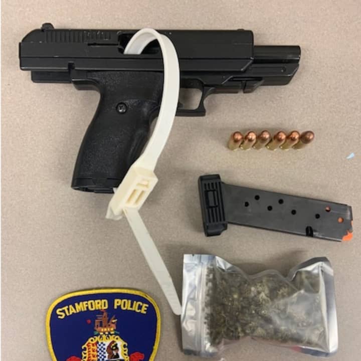 The gun and pot seized during the stop.