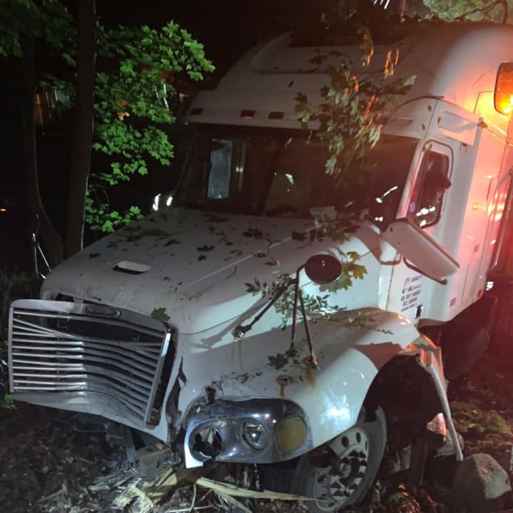 A tractor-trailer spilled fuel on Clausland Mountain Road in Blauvelt after crashing off-road.