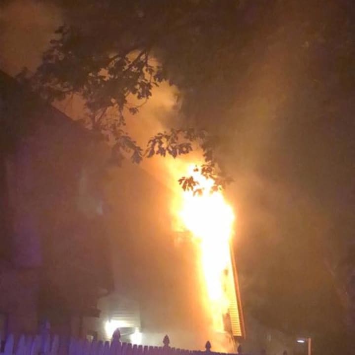 A fire ripped through an Elizabeth apartment building Tuesday night, displacing dozens of people