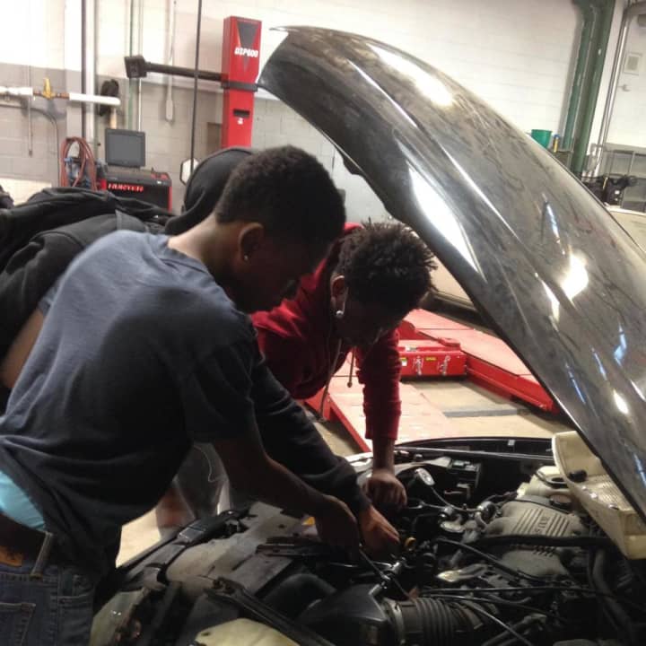 Students in Mount Vernon High School&#x27;s automotive repair program.
