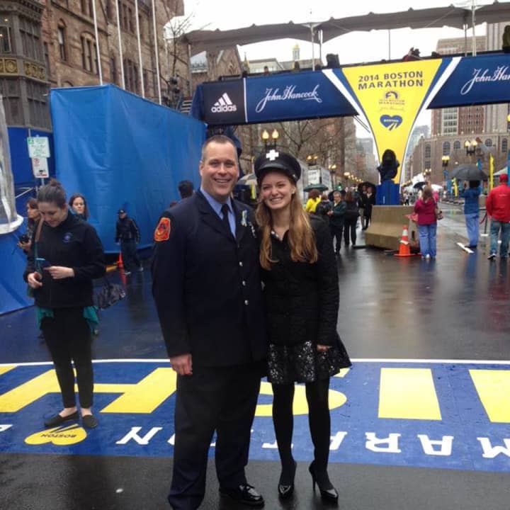 Victoria McGrath and Jimmy Plourde at the Boston Marathon finish line.