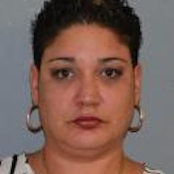 Damaris Arocho was arrested after allegedly trying to cash a check using a counterfeit driver&#x27;s license.