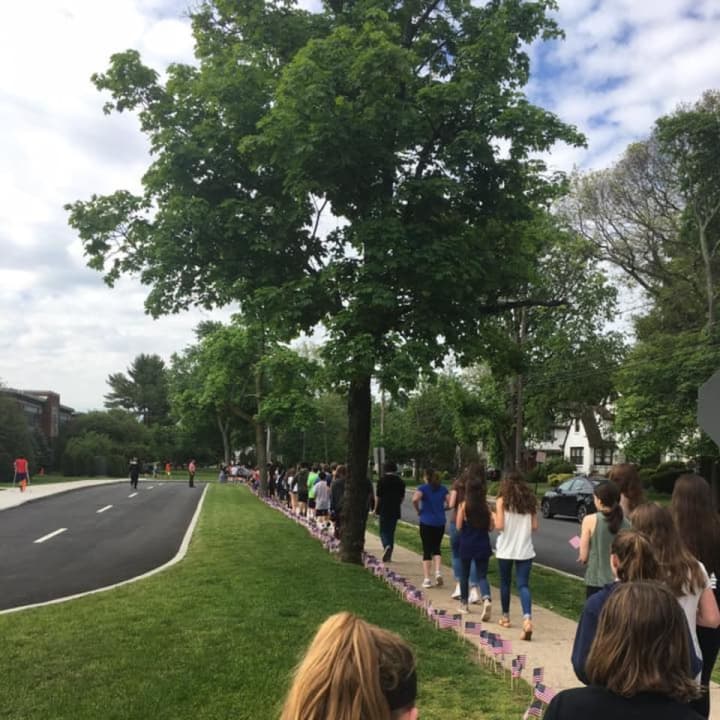 Benjamin Franklin Middle School’s students and staff members placed flags on the lawn outside the school during a Memorial Day assembly May 19.