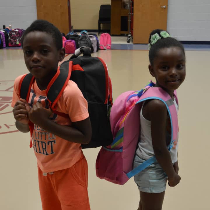 Two Danbury children are happy recipients of United Way’s Back to School program.