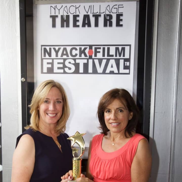 Patti Panayotidis and Betsy Frano Feeney hold the People&#x27;s Choice award, which they received at the 2016 Nyack Film Festival.