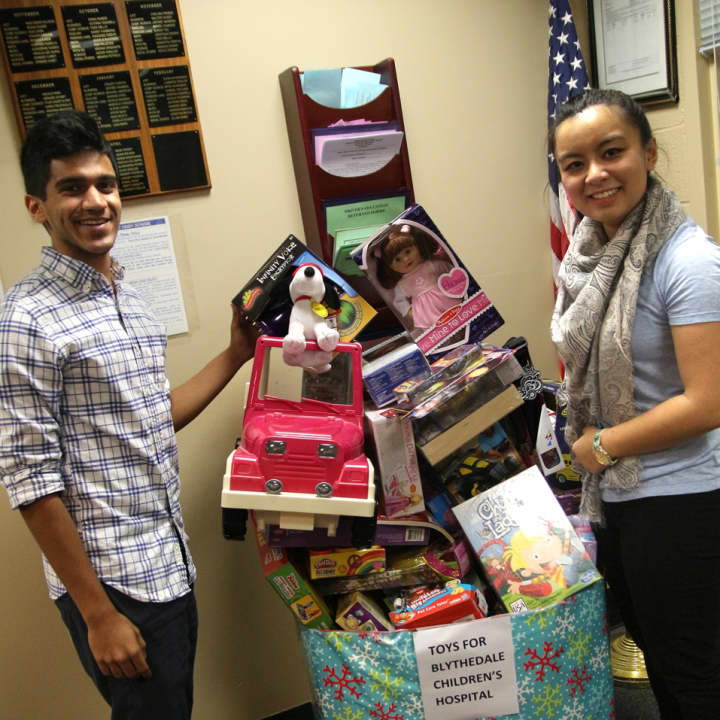 George Ittan and Noelle Santos of Westlake High School&#x27;s National Honor Society help collect and distribute toys and other gifts for young patients at the Blythedale Children&#x27;s Hospital in Valhalla.