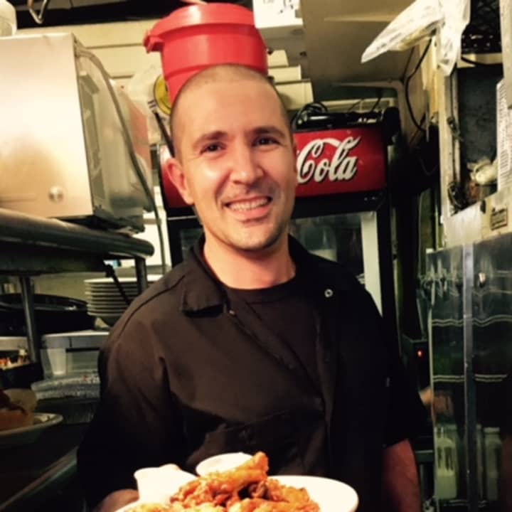 <p>Tom DeSocio of The 101 Pub in Bogota with Bergen County&#x27;s winning wings.</p>