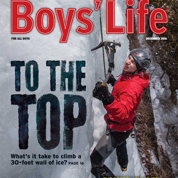 Dunlin Stathis, a Katonah resident and alum of Boy Scout Troop 154 in Goldens Bridge, climbs an ice wall at camp last February. The Eagle Scout was featured on the cover of &quot;Boys&#x27; Life&quot; magazine.