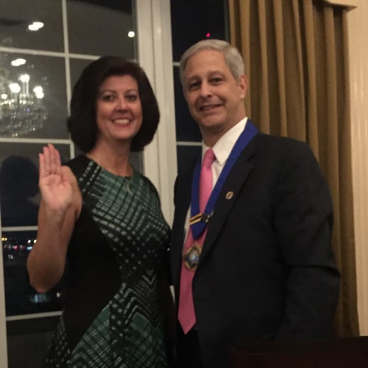 Fairfield Town Clerk Betsy Browne took her oath of office as president of the New England Association of City and Town Clerks from Vincent Buttiglieri, who is president of International Institute of Municipal Clerks.