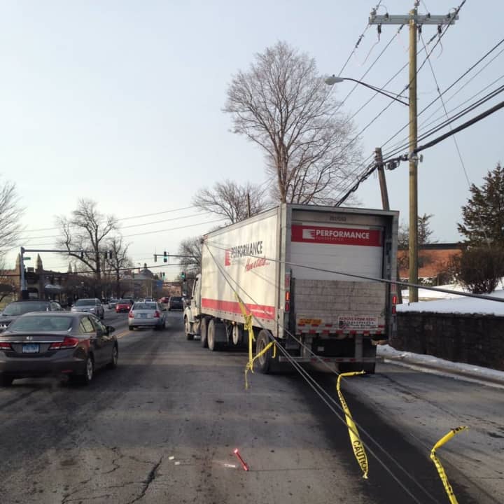 Maple Avenue closed in Greenwich after a truck pulled down wires on Monday morning.