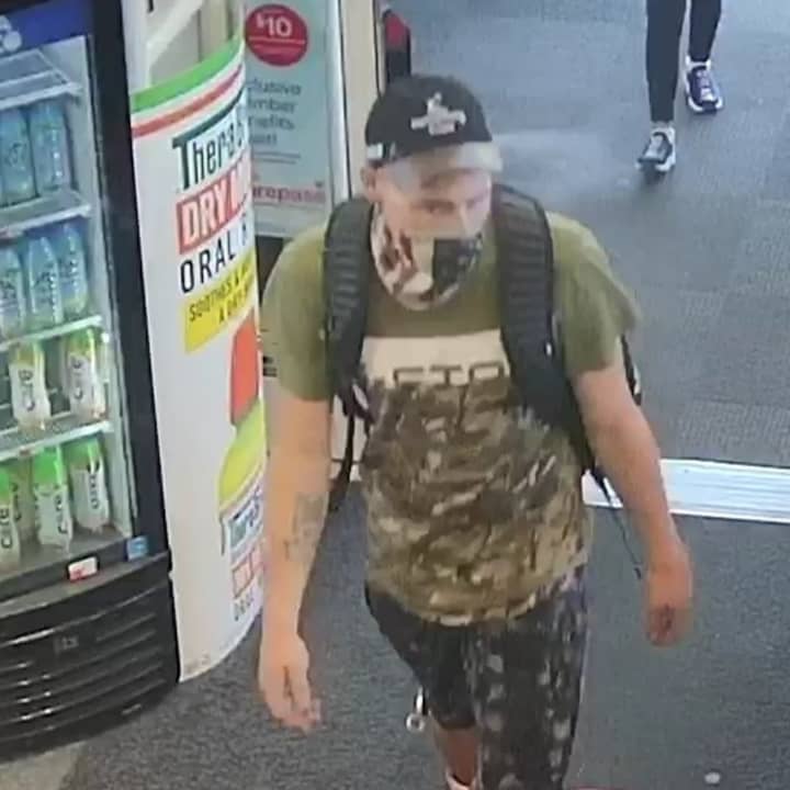 Police are searching for a man who allegedly stole about 30 cans of Red Bull from a store and shoved a store employee.