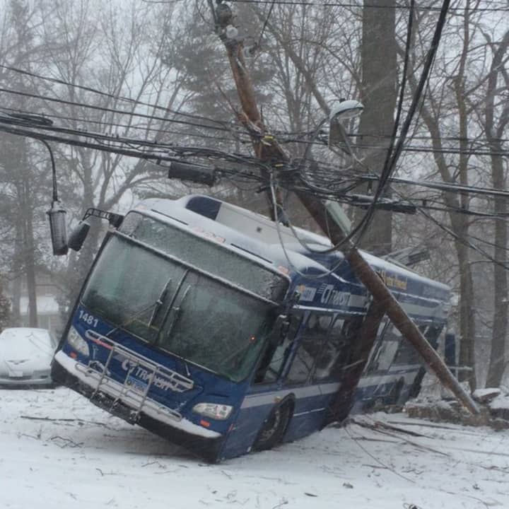 CTTransit bus slammed into a stone wall and utility pole at Soundview Drive and Arch Street on Saturday morning as the storm began.