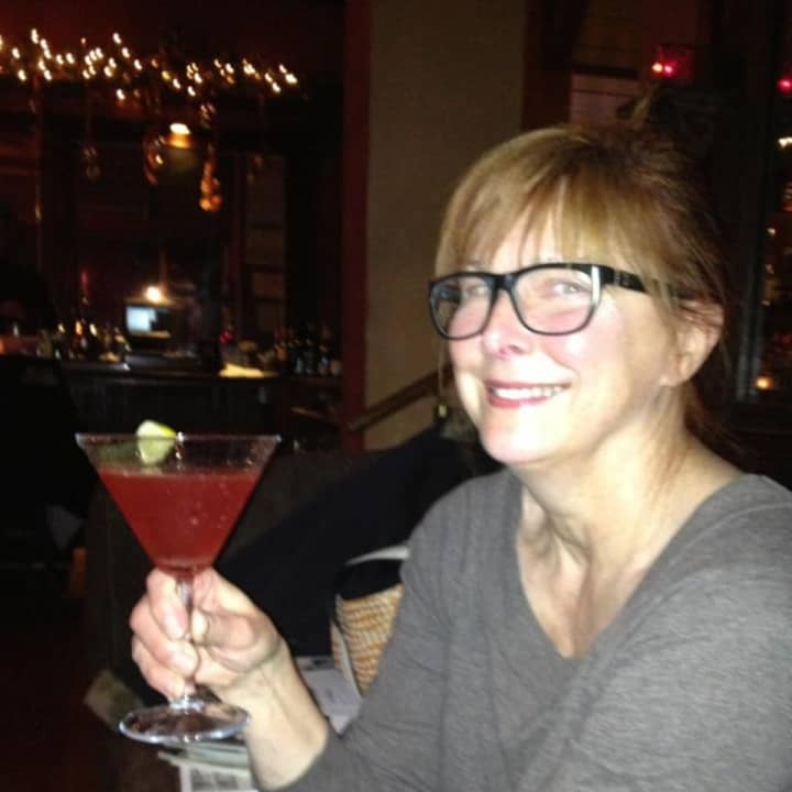Cathryn Fadde, owner of Cathryn&#x27;s Tuscan Grill in Cold Spring, enjoys one of the restaurant&#x27;s signature holiday drinks.