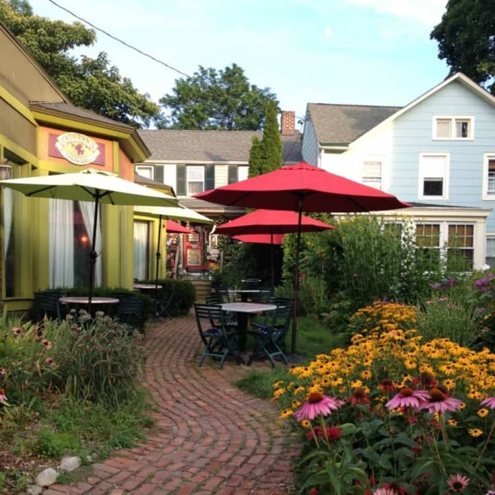 A brick path and a garden of wildflowers draws folks into Catheryn&#x27;s Tuscan Grill in Cold Spring.