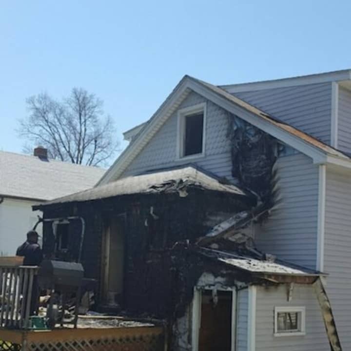Fire damage was contained to the rear of a house on Webb Avenue in Stamford on Sunday.