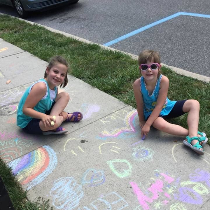 Kids brighten up the sidewalks of East Rutherford Memorial Library.