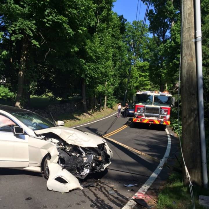 The Greenwich Fire Department responds to a crash Saturday at Stanwich Road and Carissa Lane.