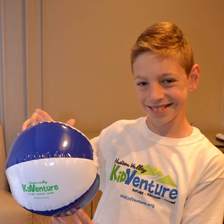 A local kid with KidVenture gear.