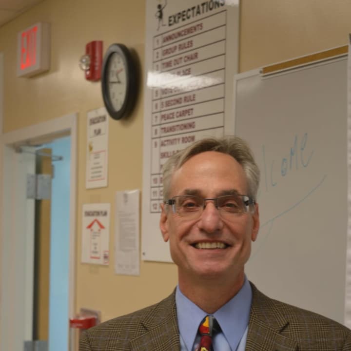 Dr. Steven M. Kant poses in a renovated room at the Boys &amp; Girls Village in Bridgeport on Tuesday afternoon. 