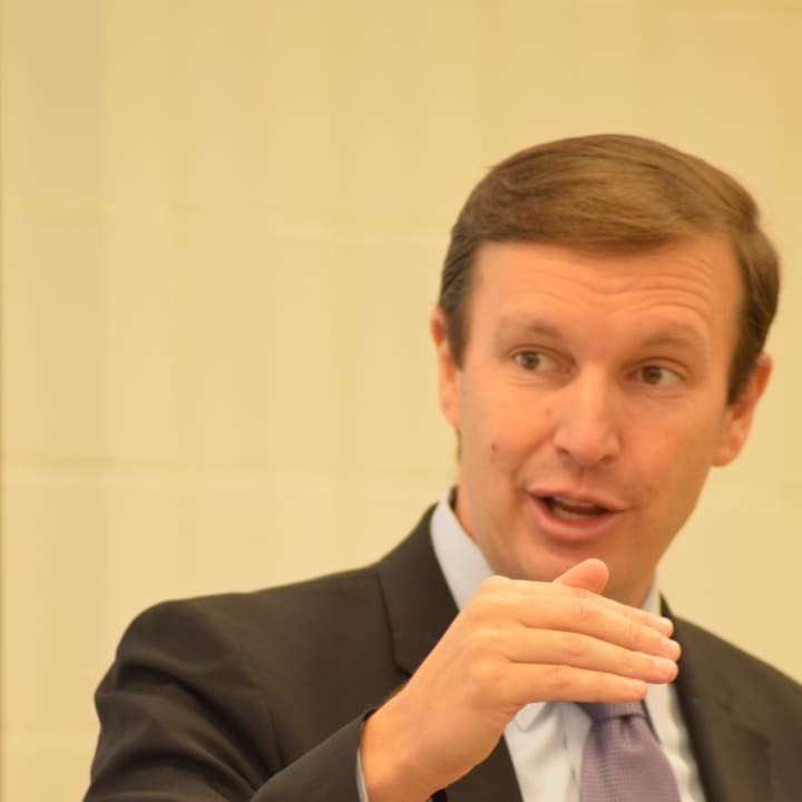 U.S. Sen. Chris Murphy talks with students of the Future Business Leaders of America Club at Norwalk High School on Thursday morning. 