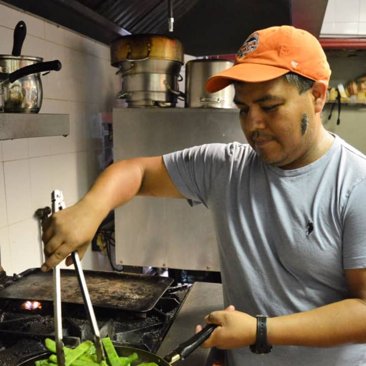 Victor Sanchez cooks up some cactus in his Teaneck restaurant.