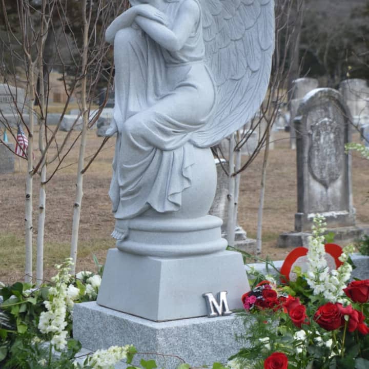 A resting angel statue marks actress Mary Tyler Moore&#x27;s grave in Fairfield.