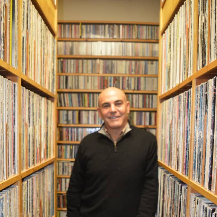<p>General Manager Steve di Costanzo stands amid the canyons of records ready to be played at WPKN-FM of Bridgeport.</p>