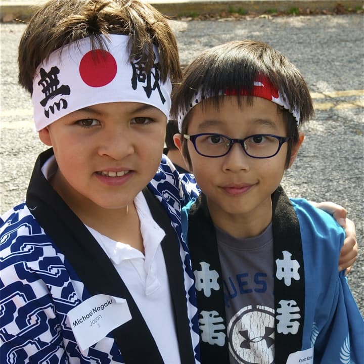 Students representing Japan march in the Julian Curtiss School&#x27;s Parade of Nations at Thursday&#x27;s U.N. Day celebration in Greenwich.