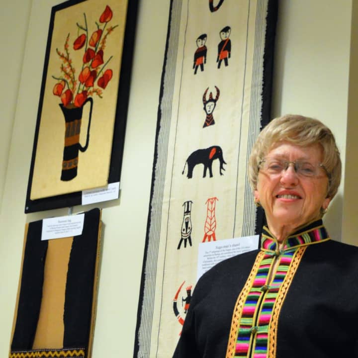 Judy Manton at her &quot;Fabulous Fabrics from Five Continents&quot; exhibit at the Bergenfield Public Library.