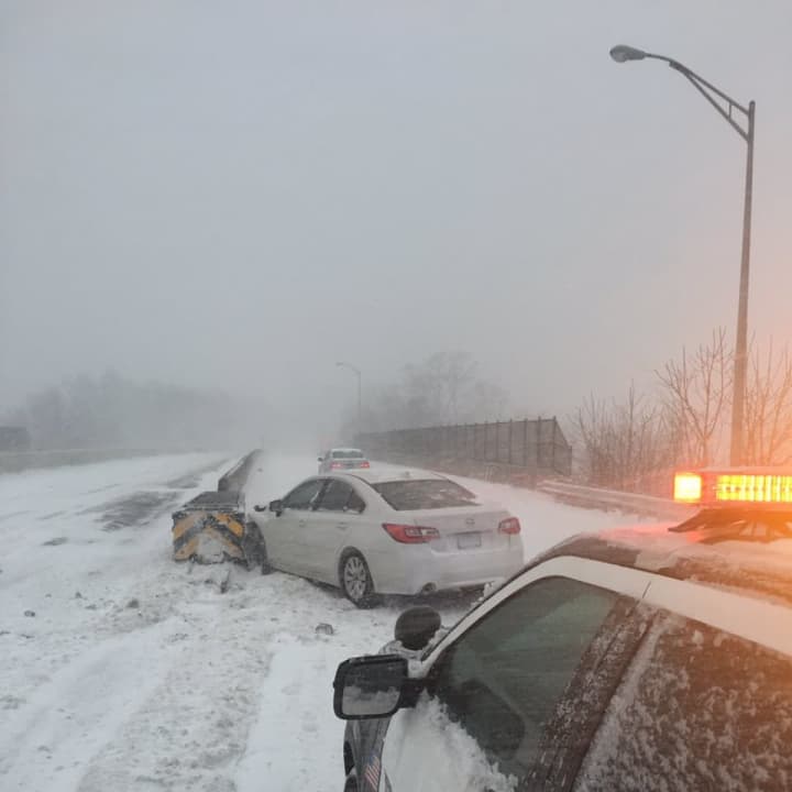 Roads are slick and visibility is poor in Norwalk, so police are advising people to stay off the roads