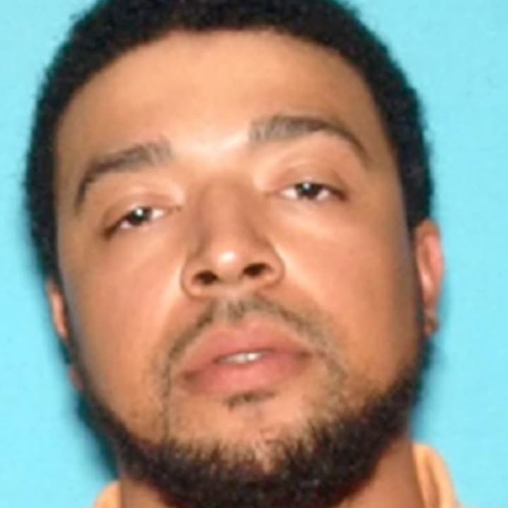 Lavelle T. Davis, 33, of Galloway, N.J., one of two men facing charges in connection with a triple homicide in New Jersey, was arrested in Yonkers Saturday.
