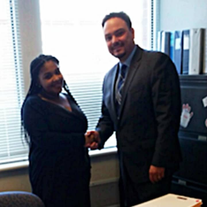 Diamond Sead with Director of the School Based Health Centers, Carlos Reinoso Jr.
