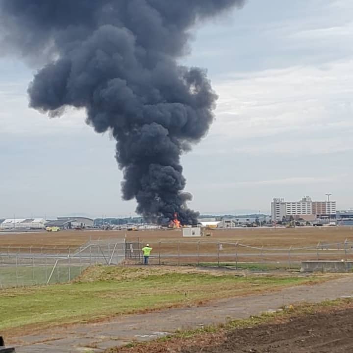 A plane crash at Bradley Airport has killed at least two people.