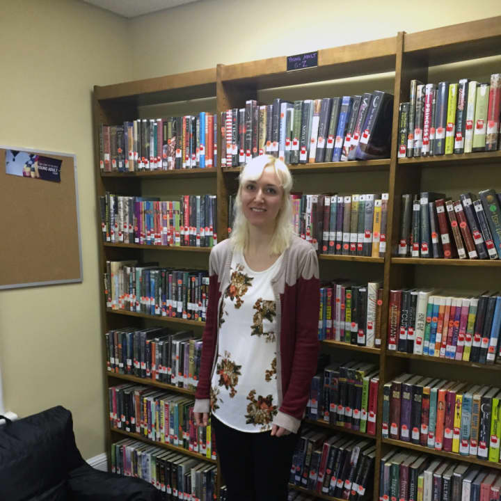 Erin Douglass in the new Young Adult Room.