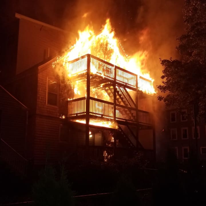 Fire tears through a multi-family home in Chelsea around 1 a.m. on Tuesday, Aug. 2.