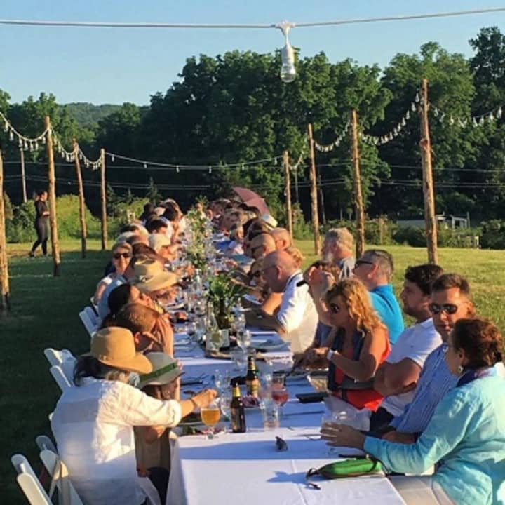 Fishkill Farms in Hopewell Junction is literally bringing the table to the farm for its dinner Aug. 27. Fruits and veggies from its own orchard and fields will be featured on the menu.