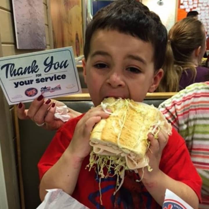 A youngster supports the troops at Jersey Mike&#x27;s.