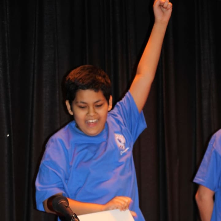 Seventh-grader Faisal Saquib cheers as he wins Pocantico Hills&#x27; Geography Bee for a second consecutive year.
