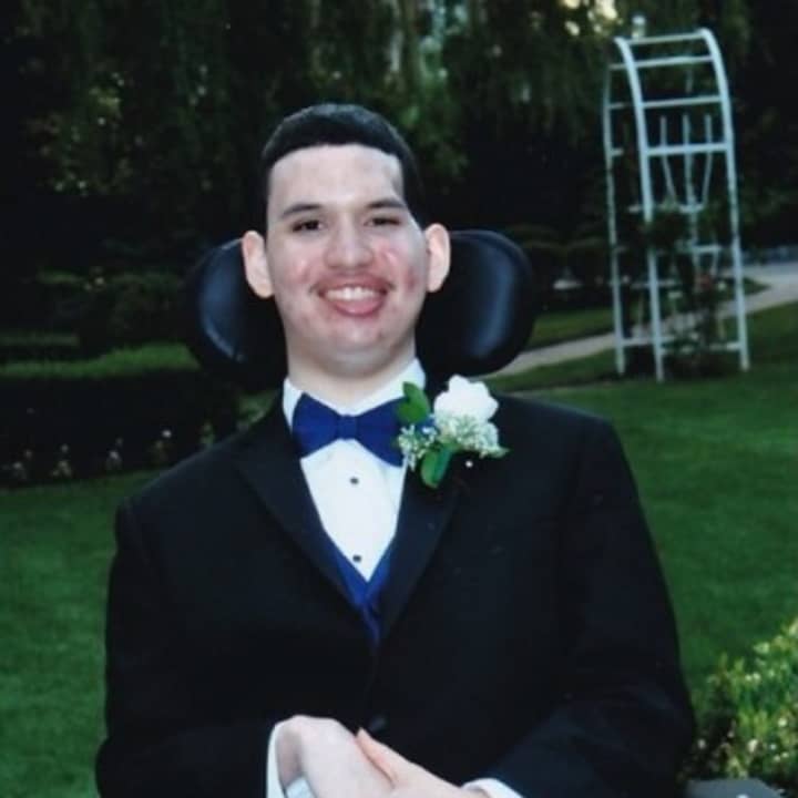 Aris Gomez, 18, recently attended prom at North Rockland High School. The Garnerville teen was felled by a brain aneurysm when a 15-year-old honor student there. Family friends are trying to raise $60,000 to buy him a wheelchair accessible van.