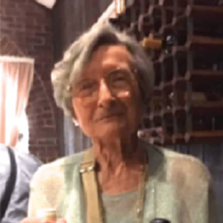 Denise Berthier, a member of Gramatan Village, attends a recent wine tasting at Bronxville Wine and Spirits.