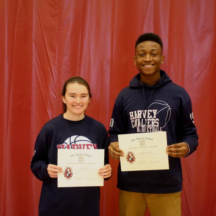 Julia Frisch and Rohan Cassells with their top student-athlete award certificates.