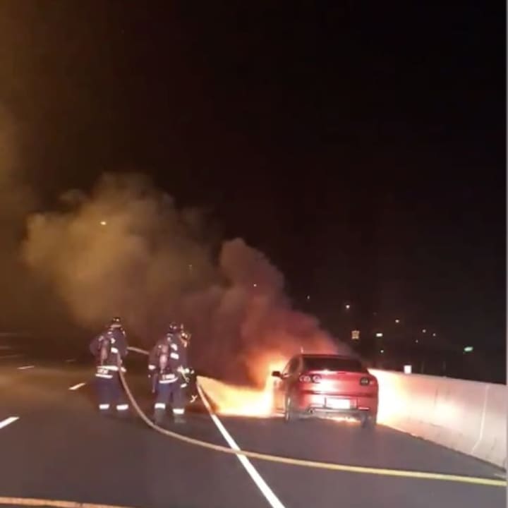 Stratford firefighters extinguished an engine compartment fire on I-95.