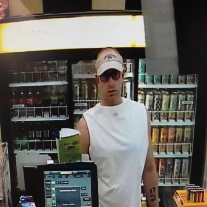 Norwalk police are searching for a suspect (pictured above) involved in multiple thefts of lottery tickets.