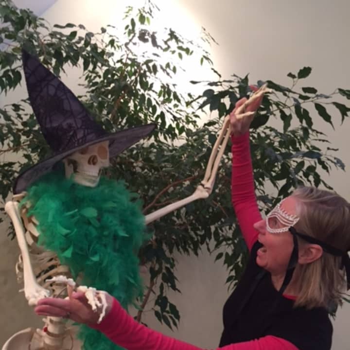 Milton the skeleton is certainly enjoying Halloween in Rye, dressing up as a witch and tangling with a ballerina. 