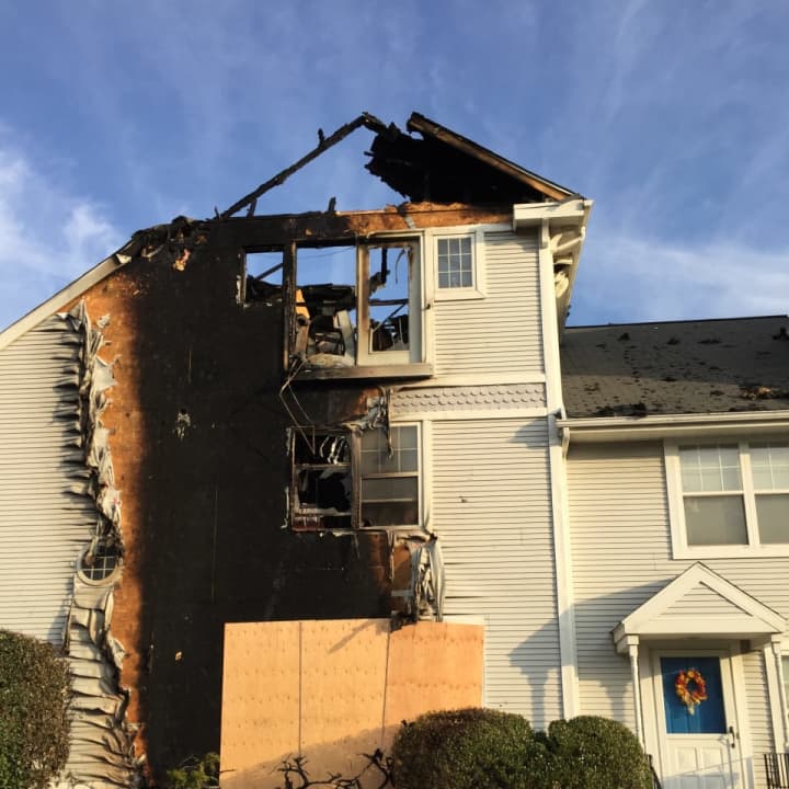 A fast-moving fire destroyed two units of a condominium complex in Stamford.