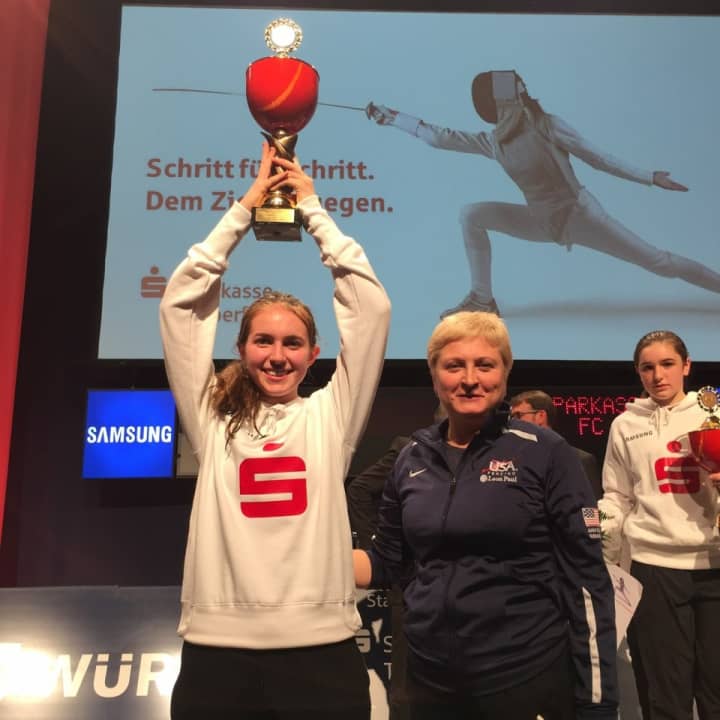 Armonk resident Sylvie Binder successfully defended her 2014 fencing title.
