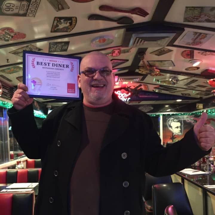Harry Mihas of Oakland Diner with his DVlicious certificate.