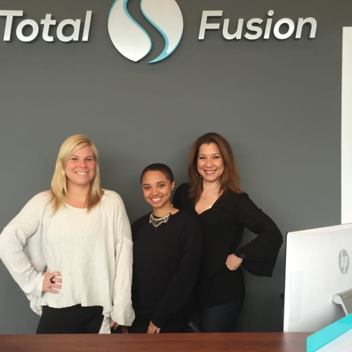 Some of the staff at the new TotalFusion in Harrison; left to right, Megan Carron, Stephanie Jiminez, and Toni DAmario (Fiore).